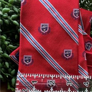 Daniel Cremieux red tie with Dc medallions